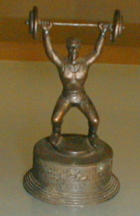 Antique Muscle Man 
      Sharpener